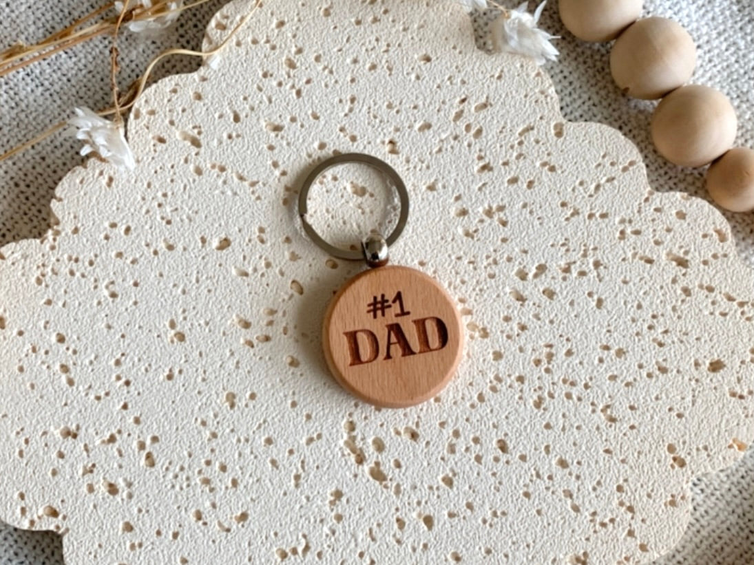 Wooden keychain with '#1 DAD' engraving. Engraved Keyring gift for Father's Day