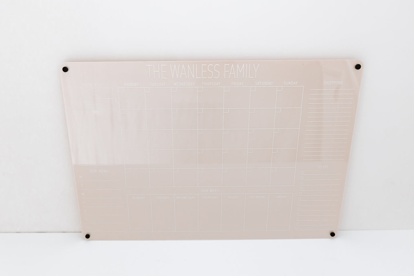 Personalised Monthly Acrylic wall calendar with coloured acrylic backing Nude Ivory and black sign standoffs