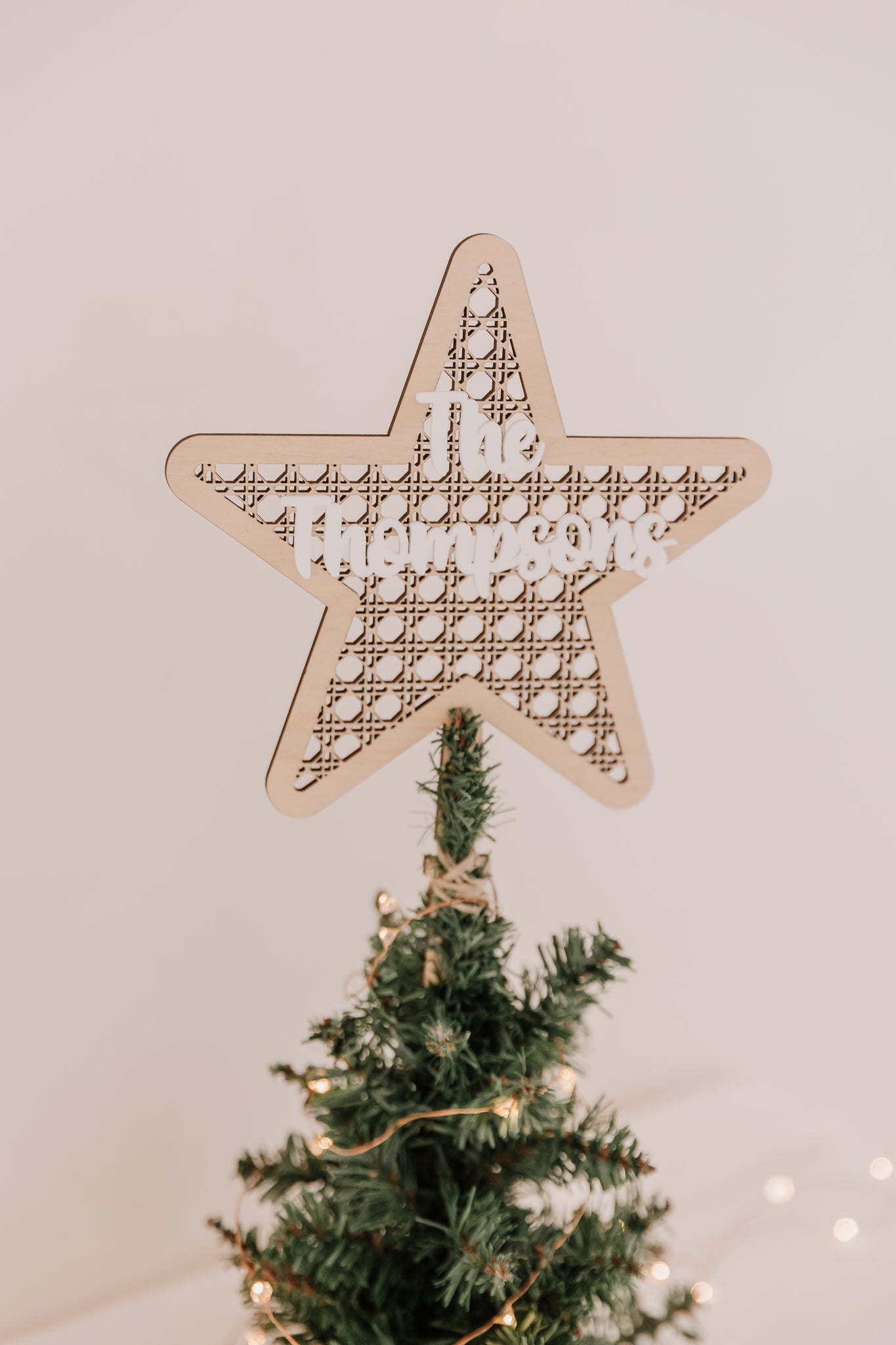 Rattan look wooden Christmas Tree Star personalised with family name