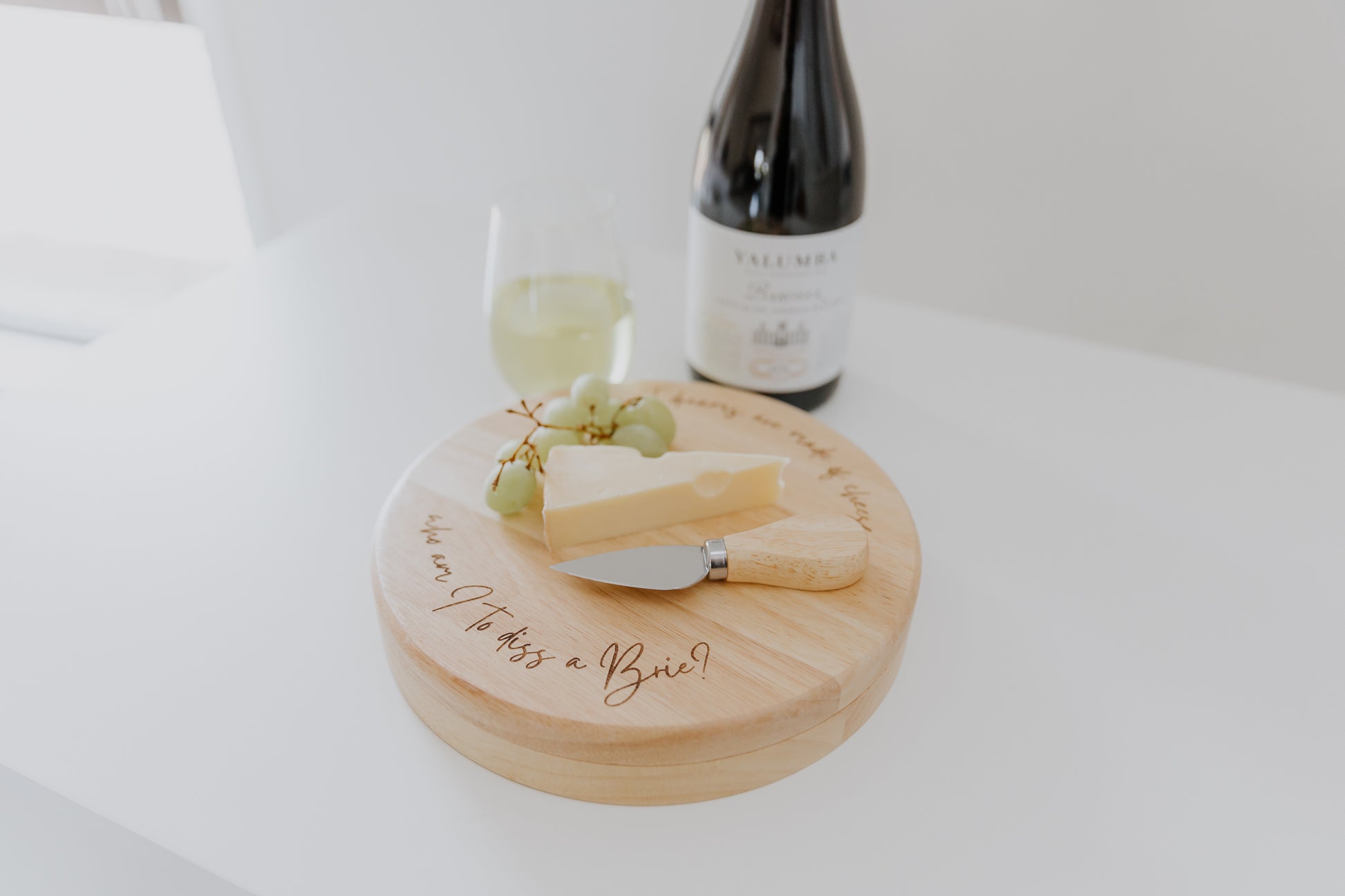 Engraved wooden round cheese board